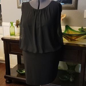 Black sheath dress with sheer overlay